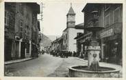 01 Ain CPSM FRANCE 01 " St Rambert en Bugey, La grande rue et la Mairie".