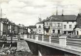 88 Vosge CPSM FRANCE 88 "Granges sur Vologne, Le pont sur la Vologne, la grande rue"